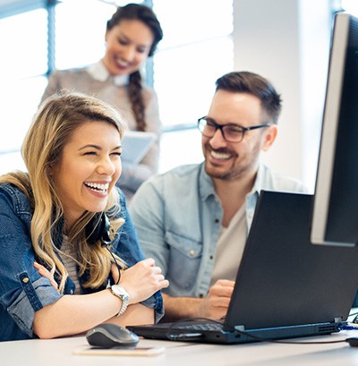 Group of colleagues smiling in office