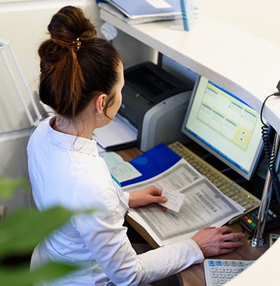 Receptionist at a desk