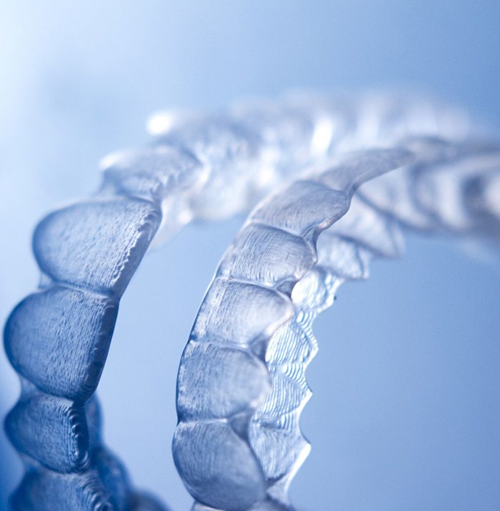 Image of clear aligners to fix gapped teeth.