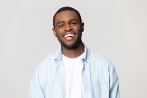 Confident, happy man with a beautiful smile from smile makeover