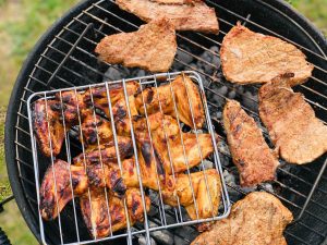 Summer foods cooking on grill