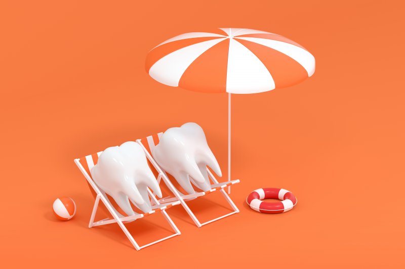 Teeth in tiny summer beach chairs