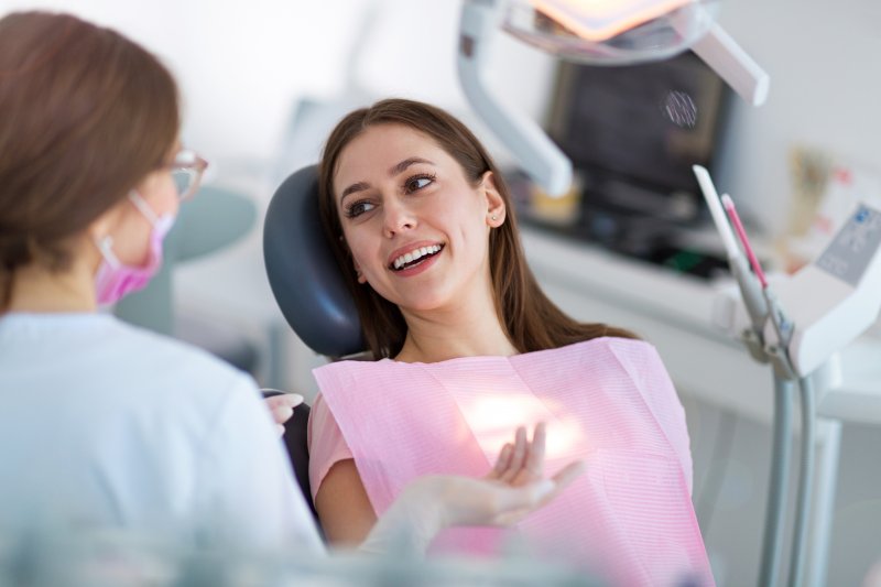 patient talking to their dentist