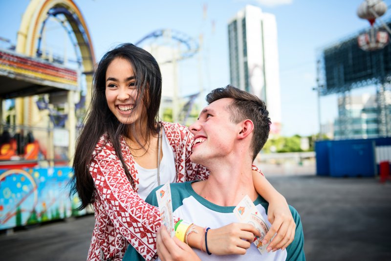 A couple smiling with good dental health