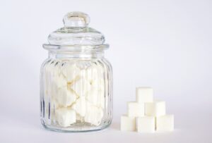 Sugar cubes on light gray background