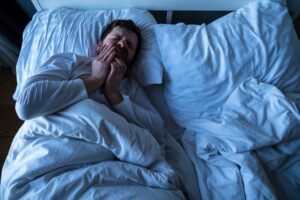 Man experiencing a toothache that got worse during the night